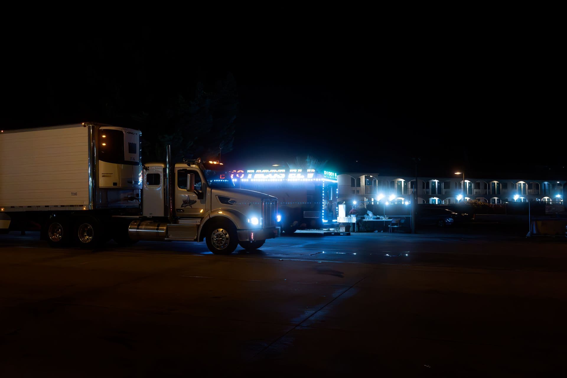 Prime mover parked at night with blue lighting